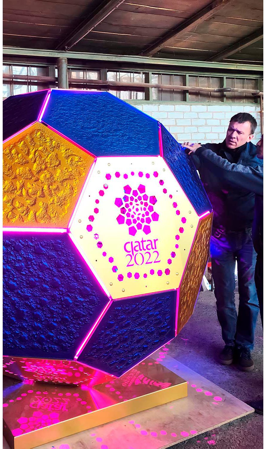Skyform Studio staff testing the "Qatar 2022" light art installation